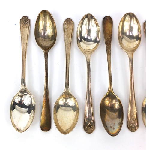 2466 - Set of six Mappin & Webb silver teaspoons with golfing interest terminals, and a pair of  unassociat... 