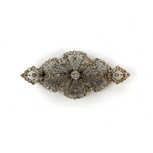 909 - Edwardian unmarked platinum fine lace work diamond brooch, 5.5cm long, approximate weight 10.0g with... 