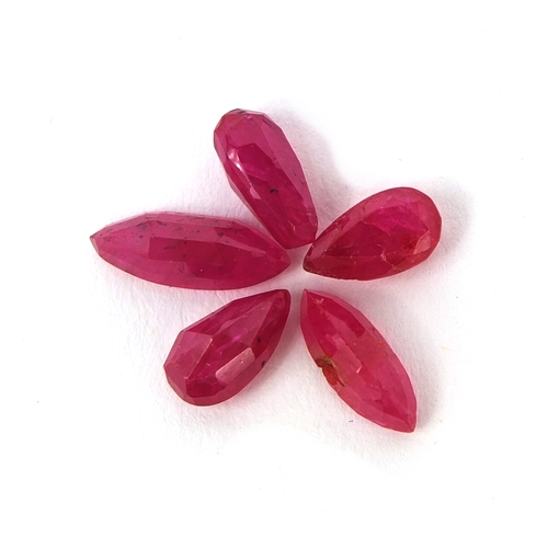 1031 - Five natural rubies, three pear shaped and two marquise shaped