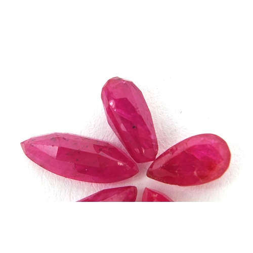 1031 - Five natural rubies, three pear shaped and two marquise shaped