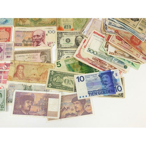 311 - Large collection of World bank notes, including Honk Kong United, States of America and the Middle E... 