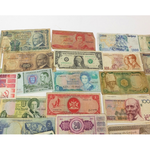 311 - Large collection of World bank notes, including Honk Kong United, States of America and the Middle E... 