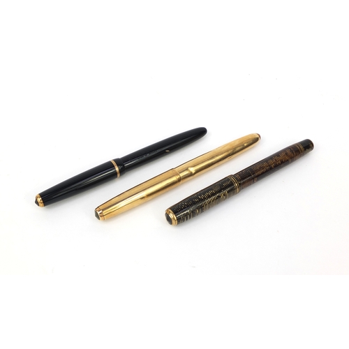 128 - Three vintage Parker fountain pens comprising a 14k gold filled, brown marbleised vacuumatic and a b... 