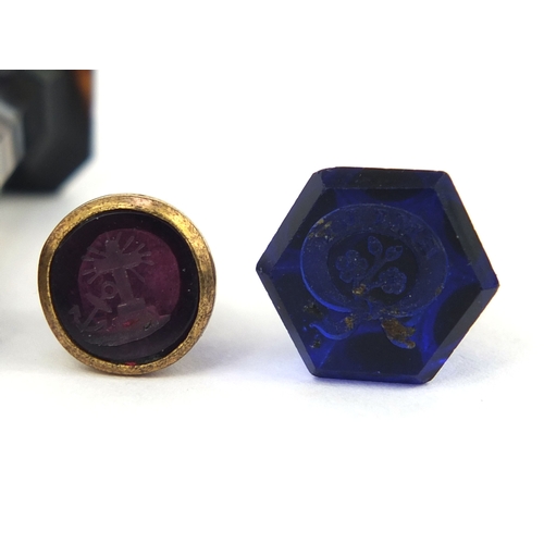 117 - Four Victorian intaglio desk seals including two agate handled examples, the largest 3.2cm long