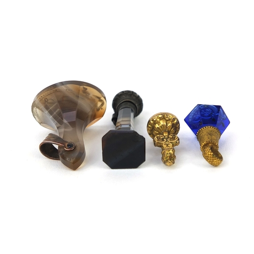 117 - Four Victorian intaglio desk seals including two agate handled examples, the largest 3.2cm long