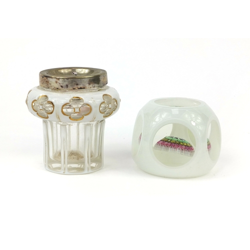 733 - White overlaid glass paperweight with colourful canes, together with a white overlaid pot with silve... 