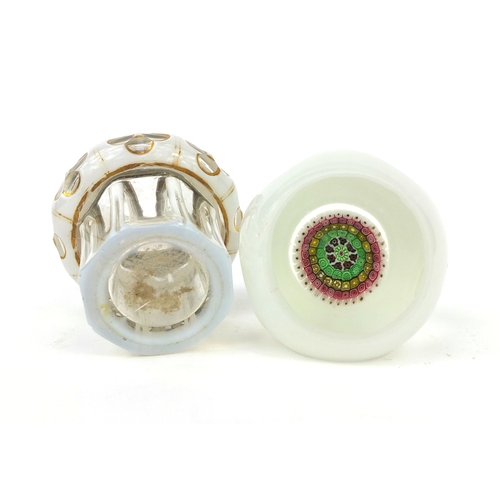 733 - White overlaid glass paperweight with colourful canes, together with a white overlaid pot with silve... 