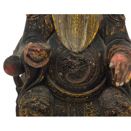 540 - Chinese wooden carving of a seated emperor wearing a dragon robe, 42cm high