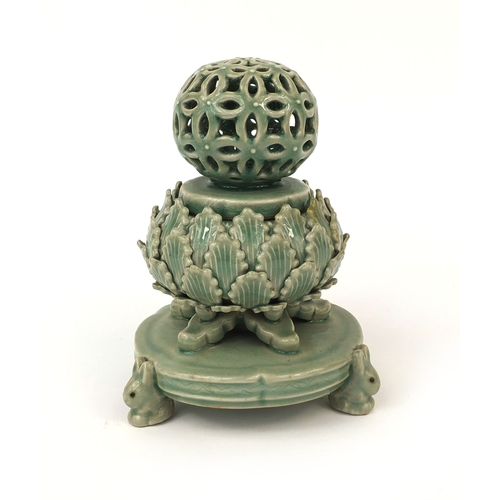 461a - Oriental celadon glazed pottery incense burner of naturalistic form, marks to the base, 18cm high