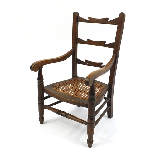 96 - Childs beech ladder back chair with cane seat, 66cm high