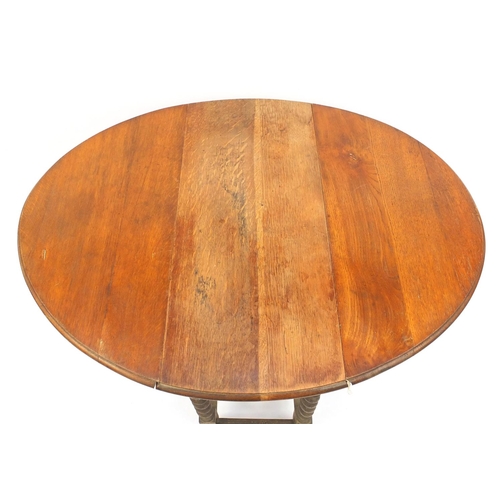 57 - Oak barley twist gateleg table, 73cm high x 112cm wide (extended) x 90cm deep
