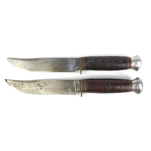 658 - Two Fagan hunting knifes with leather sheaths, 23cm long