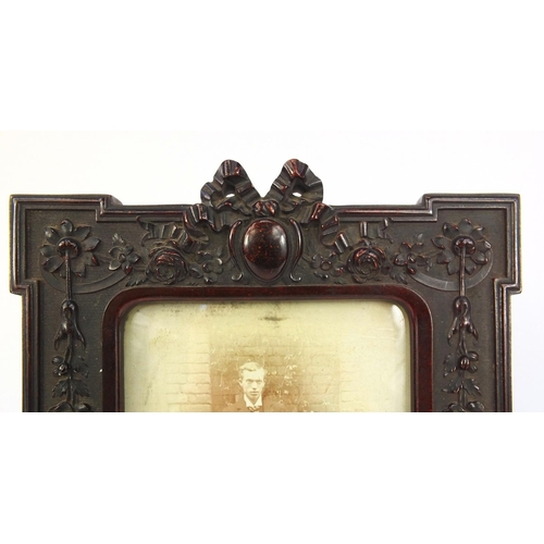 360 - Two Victorian style photo frames, the larger 26cm high