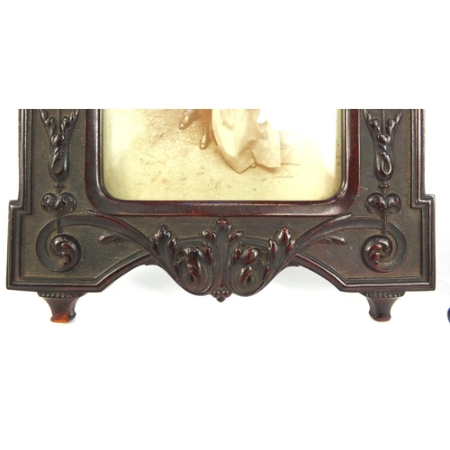 360 - Two Victorian style photo frames, the larger 26cm high