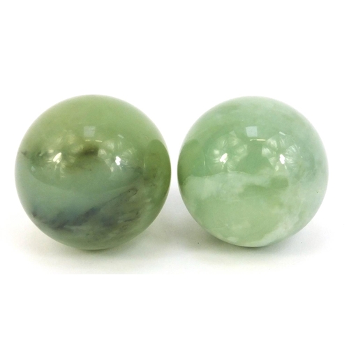 380 - Pair of polished jadeite balls, approximately 5cm in diameter