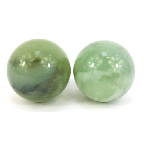 380 - Pair of polished jadeite balls, approximately 5cm in diameter