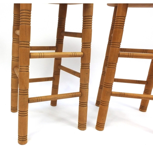 29 - Pair of good quality pine bar stools, 70cm high