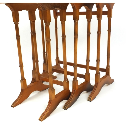 9 - Nest of three yew occasional tables, the largest 49cm high x 50cm wide x 37.5cm deep