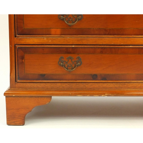 8 - Inlaid yew five drawer chest, fitted with two short above three long drawers, 72cm high x 76cm wide ... 