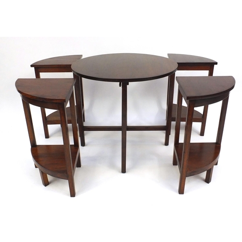 72 - Circular mahogany nest of five tables, the larger 56cm high x 60cm in diameter