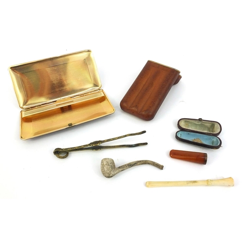 368 - Smoking items including an amber cheroot, clay pipe, set of brass ember tweezers, leather cigarette ... 