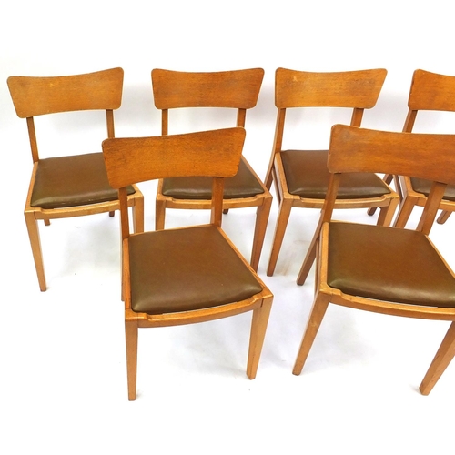 44 - Set of six G-plan E-Gomme dining chairs with brown leather drop in seats
