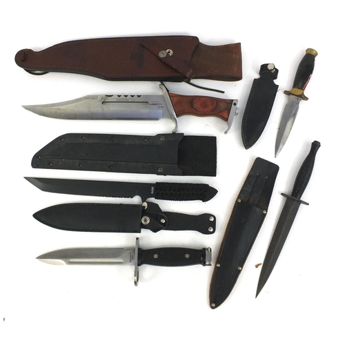 666 - Four hunting knives in sheaths and a Rambo 3 Hibben knife