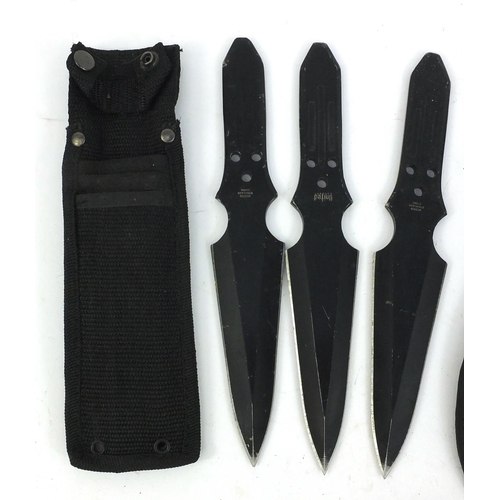 663 - Two sets of throwing knives and a knife with sheaf