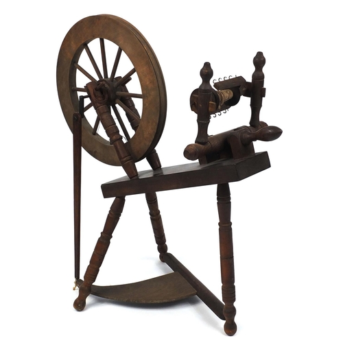 28 - Wooden spinning wheel