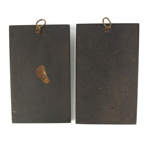 363 - Two vulcanite style panels of religious scenes, each 12cm x 7.5cm