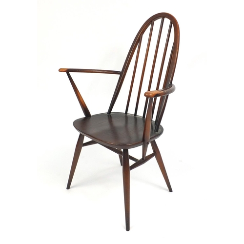 69 - Set of four Ercol stick back dining chairs including a carver, 96cm high