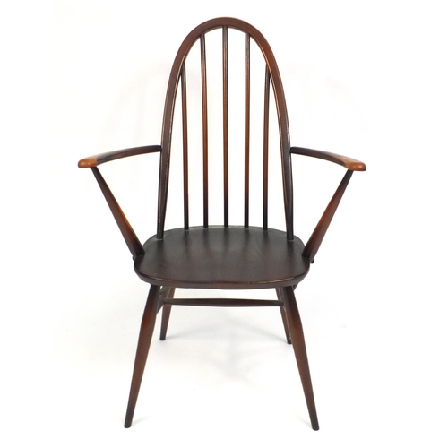 69 - Set of four Ercol stick back dining chairs including a carver, 96cm high