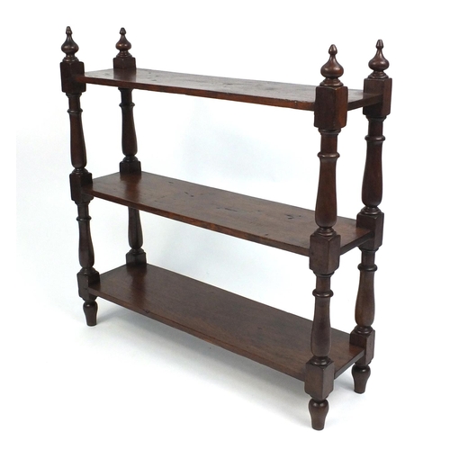 5 - Mahogany three tier buffet supported on baluster turned legs with turned finials, 93cm high x 92cm w... 