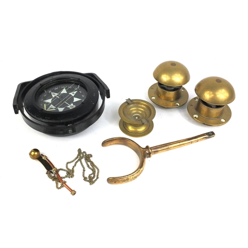 643 - Nautical items to include ships compass, a brass oar support, brass and copper boatman's whistle and... 