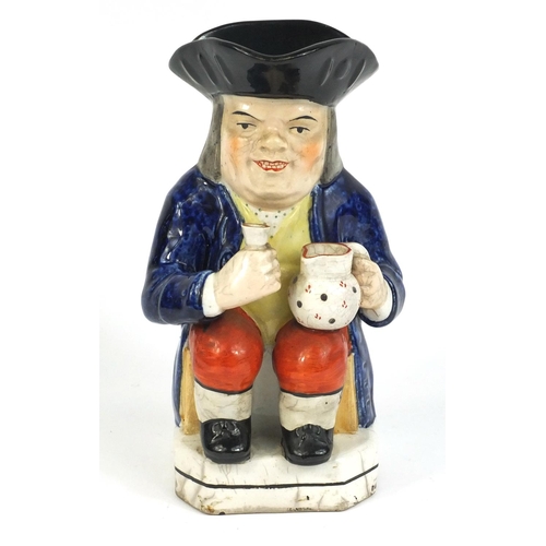 416 - Victorian Staffordshire Toby jug with blue jacket, 24cm high