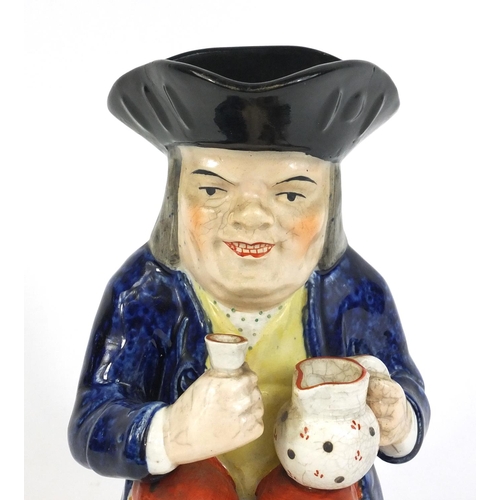 416 - Victorian Staffordshire Toby jug with blue jacket, 24cm high