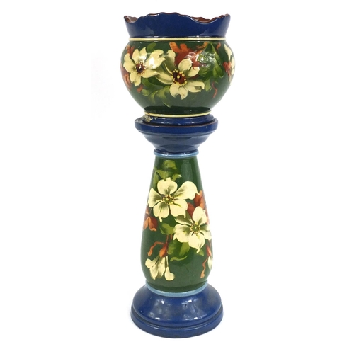 408 - Watcombe Torquay pottery jardinière on stand, 55cm high