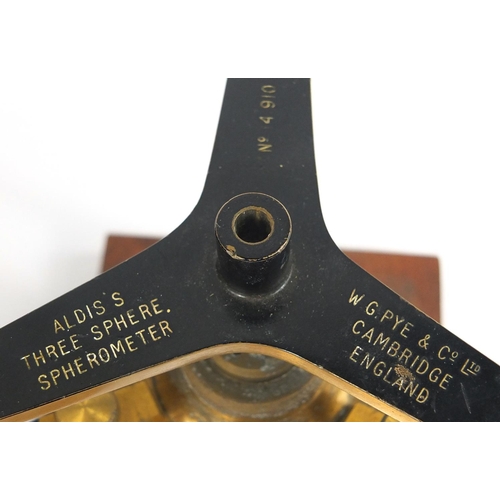 655 - Aldis's three sphere spherometer by W G Pye & Co Ltd Cambridge England, housed in a mahogany box, 24... 