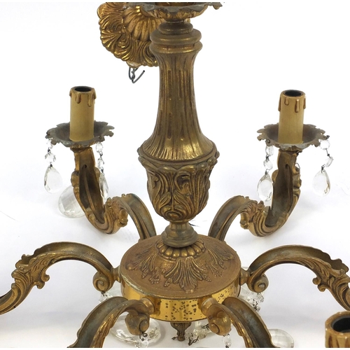 110 - Brass six branch chandelier with cut glass drops