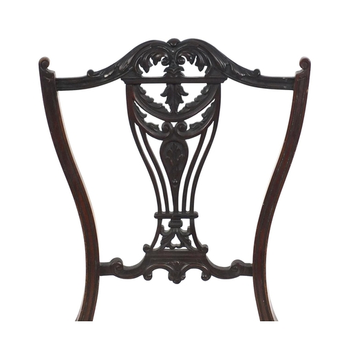 104 - Carved mahogany occasional chair, 90cm high