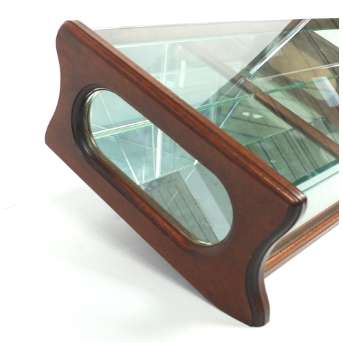42 - Mahogany, glass and mirror backed table top display cabinet, 23cm high x 67cm wide