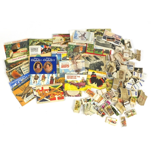 637 - Extensive selection of assorted cigarette and tea cards, some arranged in albums