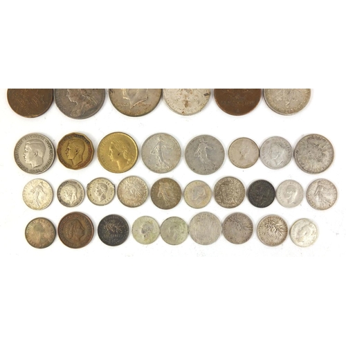 392 - Assorted World coins including silver examples, South African five cent pieces etc