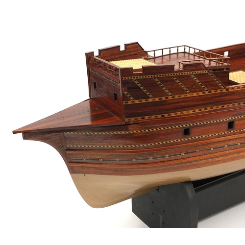 83 - Large hand built wooden galleon on stand, approximately 130cm long