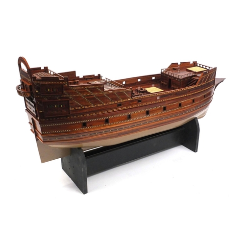 83 - Large hand built wooden galleon on stand, approximately 130cm long