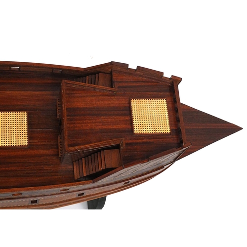 83 - Large hand built wooden galleon on stand, approximately 130cm long