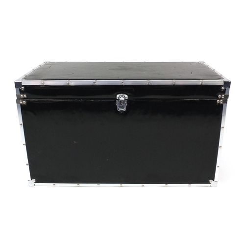 12 - Metal bound and black faux leather trunk, 49cm high x 86cm wide x 43cm deep