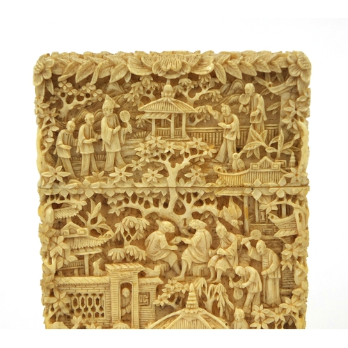 528 - Good rectangular Chinese Canton ivory card case, profusely carved with figures, pagodas and junks, c... 