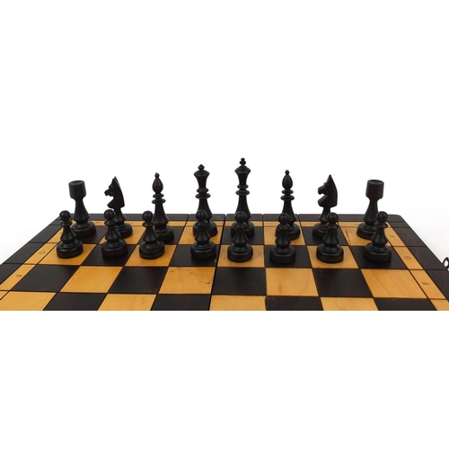 434 - *WITHDRAWN*Carved wooden chess set and board, the board 47cm square