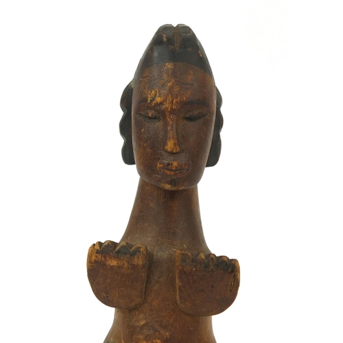 482 - Tribal interest wooden carving of a female, 30cm long